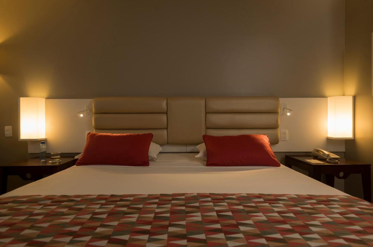 Hotel Luzeiros Fortaleza 외부 사진 A bed